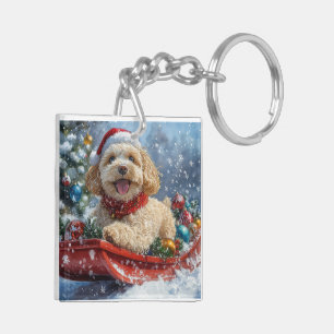 Cockapoo-hond in slee Laat het sneeuwen Kerstmis Sleutelhanger