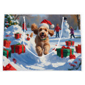 Cockapoo Rent in de Sneeuw met Kerstmuts Groot Cadeauzakje (Voorkant)