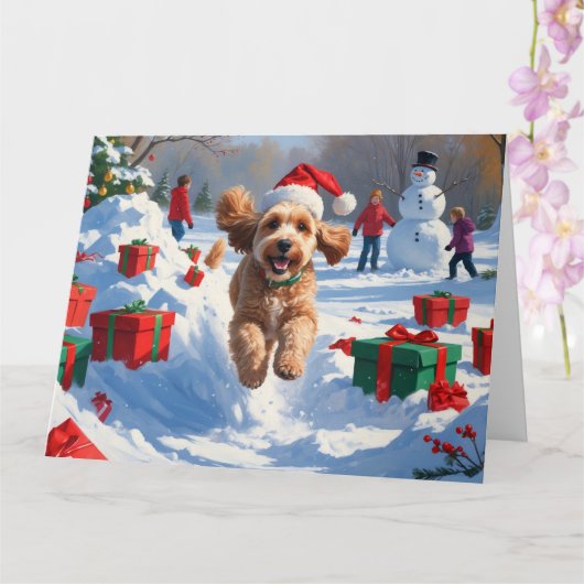 Cockapoo Rent in de Sneeuw met Kerstmuts Kaart (Orchidee)