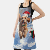 Cockapoo Rent in de Sneeuw met Kerstmuts Schort (Insitu)