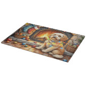Cockapoo zit bij open haard met kerstlicht snijplank (Hoek)