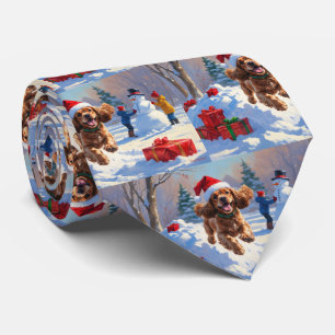 Cocker Spaniel rent in de sneeuw met kerstmuts Stropdas