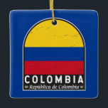 Colombiaanse vlag embleem van distressed  keramisch ornament<br><div class="desc">Colombia verontrustend embleem met de vlag en het wapen.</div>