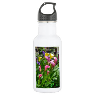 Colorful calla lily bloemen waterfles