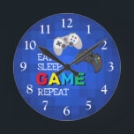 Colorful Gamer | Videogame-klok Ronde Klok<br><div class="desc">Een coole gamer klok voor al die mannen en jongens die van games houden! Hij zou elke kamer oplichten met zijn gedurfde kleuren.</div>