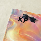 Colorful opal swirly flowing marble texture strandlaken (In situ)