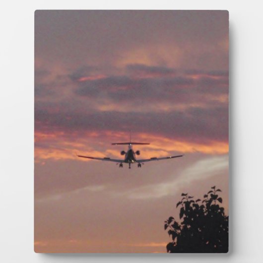 Commerciële straaljager landend bij zonsondergang fotoplaat (Voorkant)