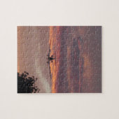 Commerciële straaljager landend bij zonsondergang legpuzzel (Horizontaal)