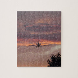 Commerciële straaljager landend bij zonsondergang legpuzzel