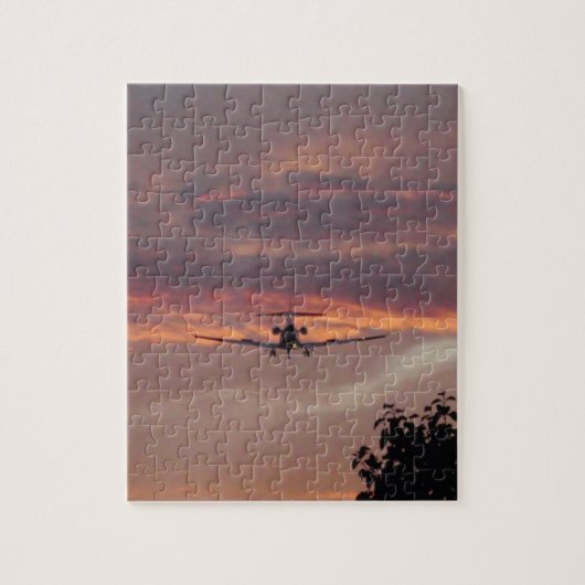 Commerciële straaljager landend bij zonsondergang legpuzzel (Verticaal)