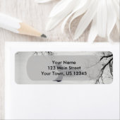 Common Loon zwemt in een noordelijk meer in de win Etiket (Insitu)