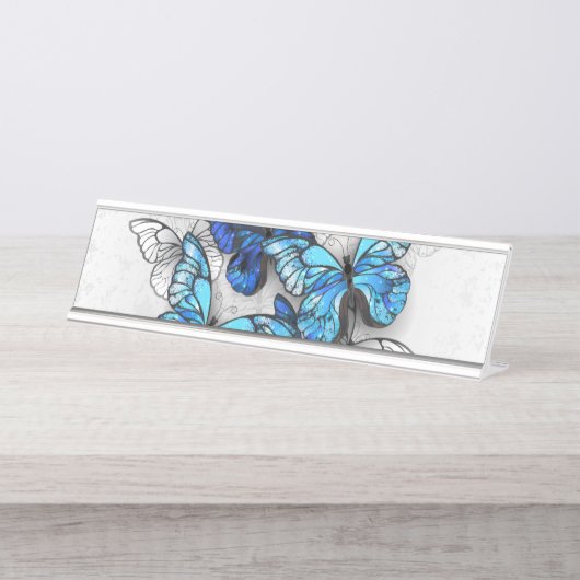 Compositie van witte en blauwe vlinders bureau naambordje (Voorkant)