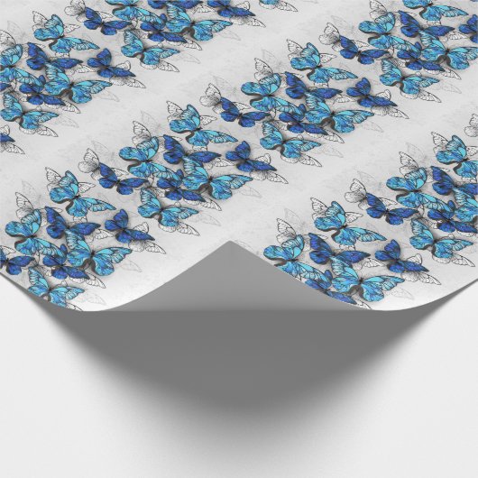Compositie van witte en blauwe vlinders cadeaupapier (Hoek)
