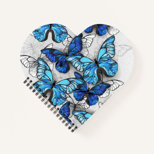 Compositie van witte en blauwe vlinders notitieboek (Voorkant)