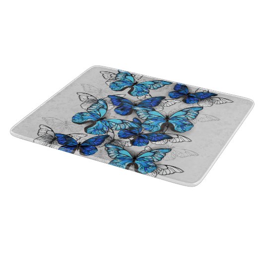 Compositie van witte en blauwe vlinders snijplank (Hoek)