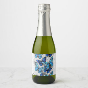 Compositie van witte en blauwe vlinders sparkling wijnetiket