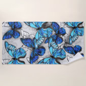 Compositie van witte en blauwe vlinders strandlaken (Voorkant)