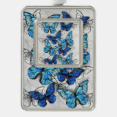 Compositie van witte en blauwe vlinders verzilverd omlijst ornament (Voorkant)
