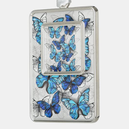 Compositie van witte en blauwe vlinders verzilverd omlijst ornament (Links)