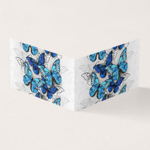 Compositie van witte en blauwe vlinders visitekaartje