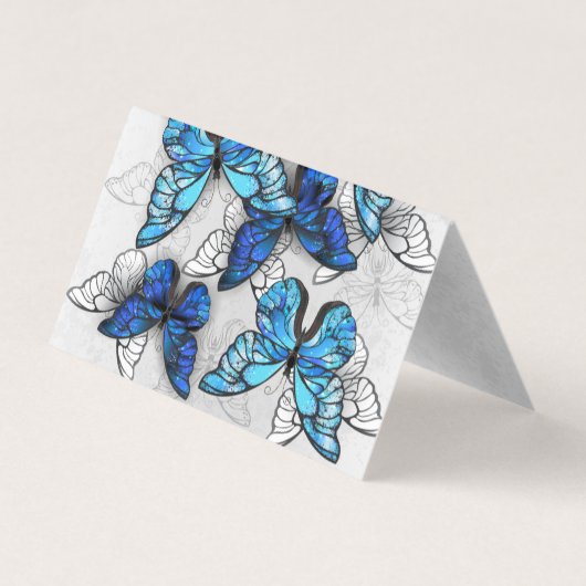 Compositie van witte en blauwe vlinders visitekaartje (Achterkant)