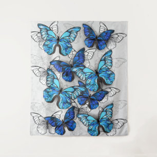 Compositie van witte en blauwe vlinders wandkleed