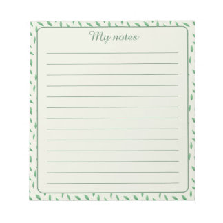 con diseño de hojas verdes notitieblok