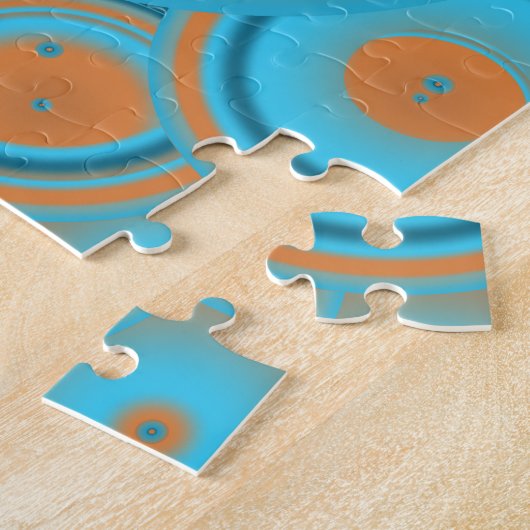 Concentrische cirkelgradiënt Oranje rustturquoise Legpuzzel (Zijkant)