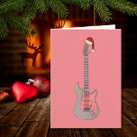 Cool Elektrische Gitaar Santa Pink Kaart<br><div class="desc">kerstgitaar Pink Girls Festive Greetings card. Elektrische gitaarmonochrome kunst met roze markering met een grappige kersthoed. Deze coole gitaarfestive groetings kaart, ideaal voor een tienermeisje, viert de energie en verscheidenheid van dit prachtige muziekinstrument. De perfecte persoonlijke vakantiekaart voor gitaristen, muzikanten en muziekliefhebbers. Zwart-wit met roze, girale gitaarafbeelding. Origineel kunstwerk van...</div>