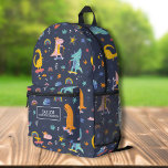 Cool Skateboarden Dinosaur gepersonaliseerde Kinde Bedrukte Rugzak<br><div class="desc">Super leuke rugzak met dinosaurussen op skateboards en scooters en de naam van je kind. Voeg een extra bonusregel tekst toe - telefoonnummer, teamnaam, gezegde, enz. - of verwijder deze. Ruimte genoeg voor boeken, computer, sportuitrusting en meer - of gebruik als reis- of logeertas ook. Koel en kleurrijk, maar toch...</div>
