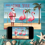 Cool Yule Santa en Flamingos Beach Kerstmis Feestdagenkaart<br><div class="desc">Introductie van onze Cool Yule Santa en Flamingos Beach Christmas Kaart - een mix van vakantietraditie en tropisch plezier! Santa en zijn flamingo vrienden op een zandstrand. Perfect voor het verspreiden van feestvreugde met een leuke twist. Groet - "Heb een koele yule"</div>