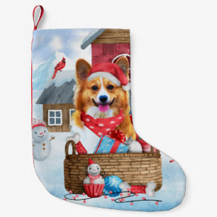 Corgi Dog in het sneeuwkersthondenhuis Kleine Kerstsok