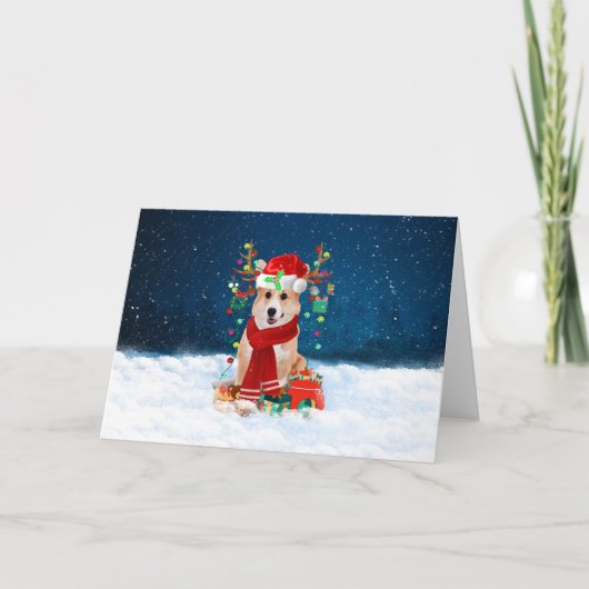 Corgi-hond in de sneeuw met kerstcadeaus feestdagen kaart (Voorkant)
