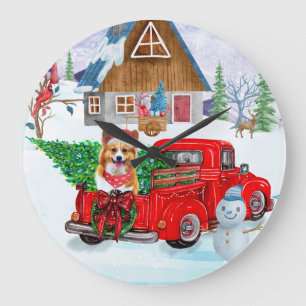 Corgi-hond in kerstbezorgingswagen sneeuw grote klok
