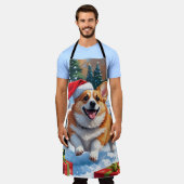 Corgi Rent in de Sneeuw met Kerstmuts Schort (Gedragen)