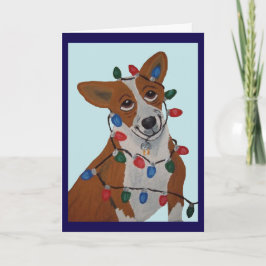 Corgi verstrikt in kerstlichtjes kaart