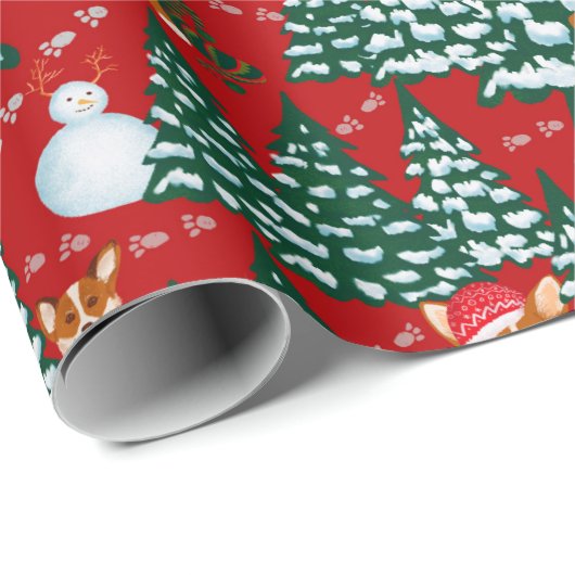 Corgis heeft plezier in het winterbos - rood cadeaupapier (Rol Hoek)