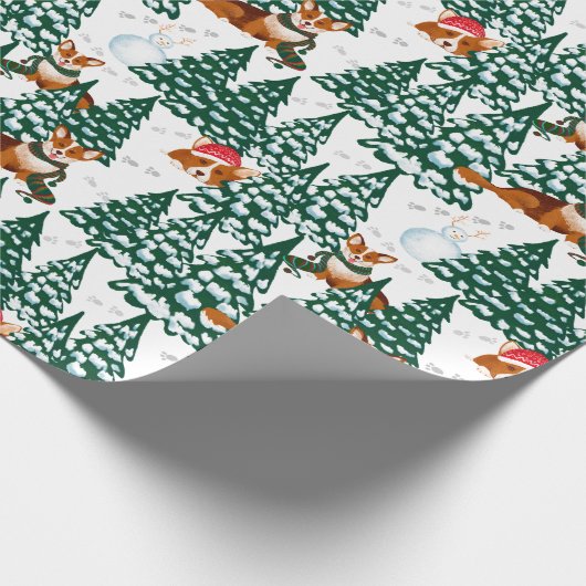 Corgis heeft plezier in het winterbos - wit cadeaupapier (Hoek)