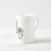 Cosmic Coffee Companion - Schattigee astronaut Porselein Kop (Voorkant rechts)