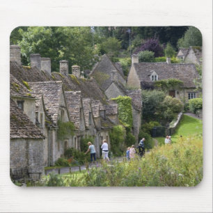 Cotswold stenen cottages in het dorp van muismat
