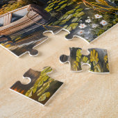 Cottage aan het meer met roeiboot legpuzzel (Zijkant)