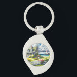 Cottage With View Of The Lighthouse Sleutelhanger<br><div class="desc">A dreamy coastal cottagecore landscape filled with soft watercolor charm and breezy seaside tranquility. A welcoming seaside cottage sits among lush garden paths, blooming flowers, and a bright white picket fence, creating a warm storybook atmosphere. In the distance, a tall lighthouse rises beside sparkling blue ocean waves, adding a classic...</div>