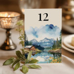 Country Lake Rustic Barn Waterverf bruiloft Kaart<br><div class="desc">Trouwtafel nummerkaart met waterverf ontwerp met een charmante rustieke trouwschuur gelegen aan de oevers van een rustig meer, omlijst door majestueuze bergen en torenhoge pijnbomen. Het waterverf landschap toont de serene schoonheid van een zonovergoten dag, met de warme houten tinten van de schuur perfect weerspiegeld in de stille wateren. Ideaal...</div>