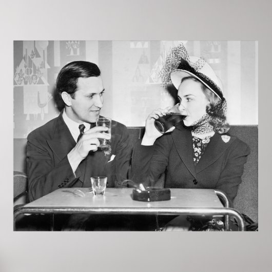 Coupled sitting together in a restaurant flirting  poster (Voorkant)