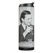 Coupled sitting together in a restaurant flirting  thermosbeker (Gedraaid links)