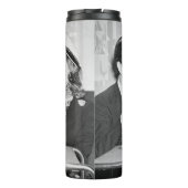 Coupled sitting together in a restaurant flirting  thermosbeker (Achterkant)