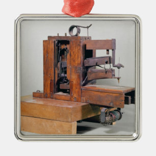 Couseuse', eerste naaimachine, 1830 metalen ornament