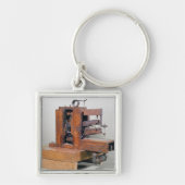 Couseuse', eerste naaimachine, 1830 sleutelhanger (Voorkant)