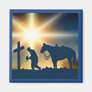 Cowboy bidden met paard bij kruisje magneet