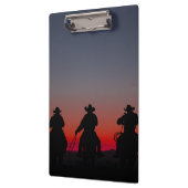 cowboy bij zonsondergang klembord (Links)